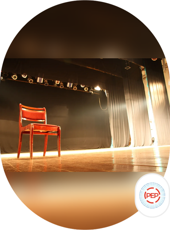 Group 13 A chair on the stage of a theater