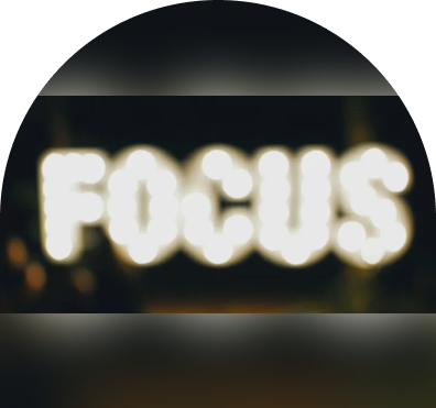 sample-img (1) A blurry image of the word focus in front of a camera.