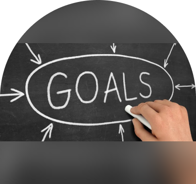 sample-img (2) A person writing on the board with arrows pointing to goals.